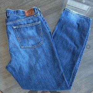 Lucky Brand Men's 363 Vintage Straight Jeans. Size 40 x 32. Distressed back hem